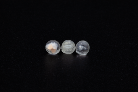 Three resin spheres